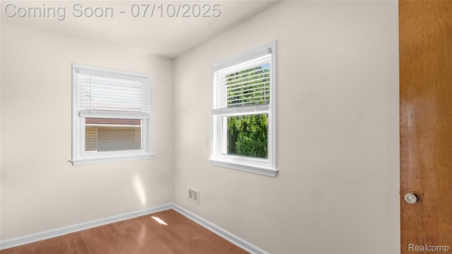 2606 Willow St, Dearborn, MI 48124 - spare room featuring baseboards and wood finished floors