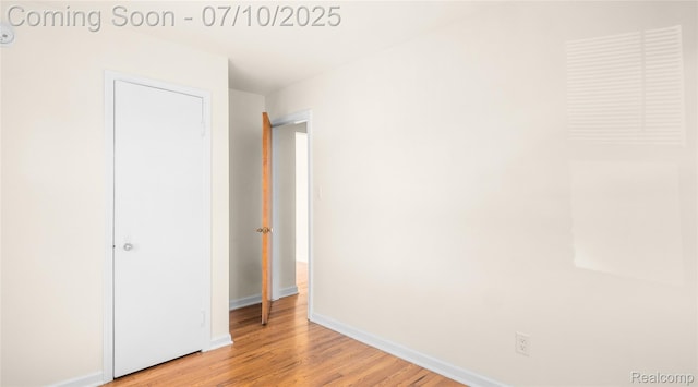 2606 Willow St, Dearborn, MI 48124 - unfurnished bedroom with light wood-style floors and baseboards
