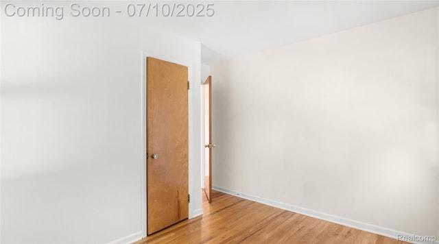 2606 Willow St, Dearborn, MI 48124 - empty room with light wood finished floors and baseboards