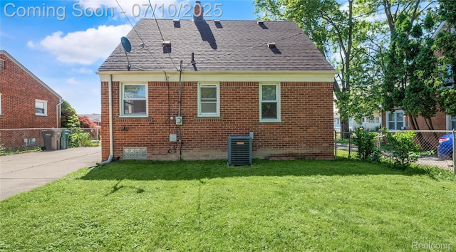 2606 Willow St, Dearborn, MI 48124 - rear view of house with brick siding and roof with shingles