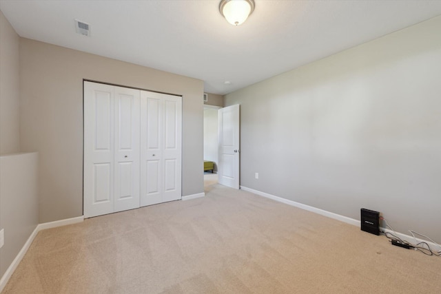 58852 Silvergrass Dr, Mattawan, MI 49071 - unfurnished bedroom with carpet floors and a closet