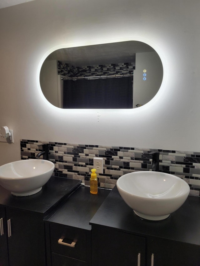 1211 Howard Ave, Muskegon, MI 49442 - bathroom with vanity and backsplash