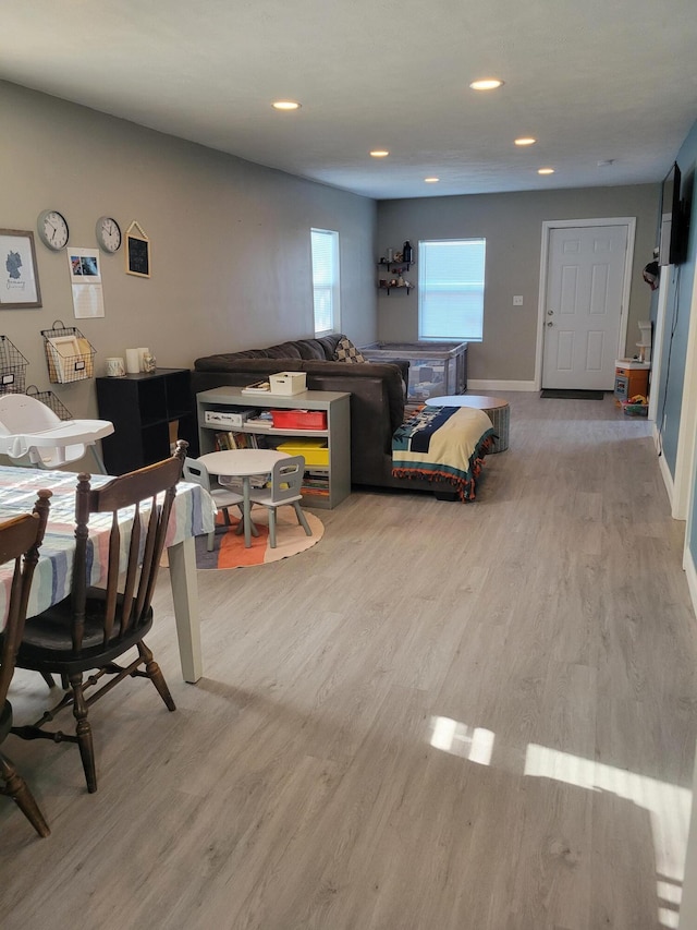 1211 Howard Ave, Muskegon, MI 49442 - living area featuring wood finished floors and recessed lighting