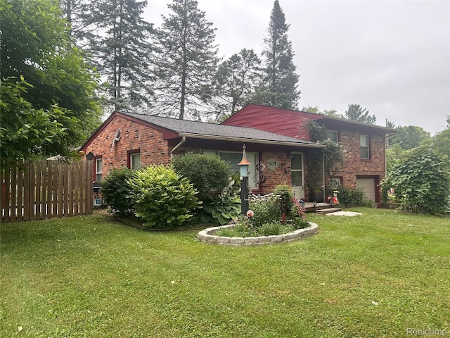 305 Goldengate St, Lake Orion, MI 48362 - view of front of home featuring brick siding and an attached garage