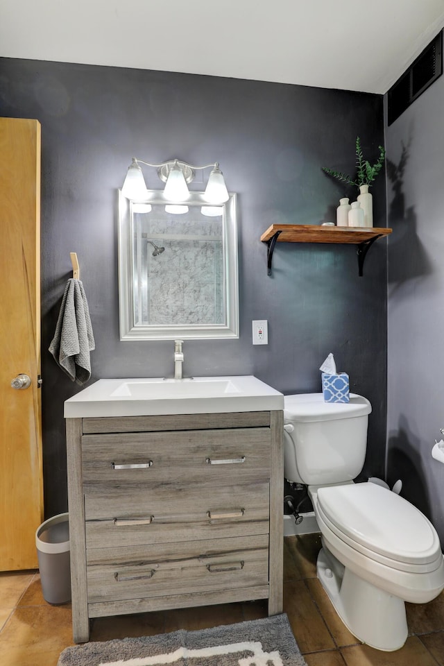 1441 Lewison Ave NE, Grand Rapids, MI 49505 - bathroom with vanity and tile patterned flooring
