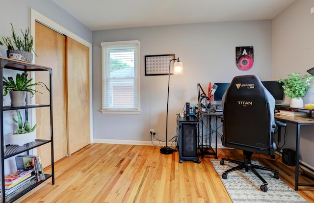 1441 Lewison Ave NE, Grand Rapids, MI 49505 - home office with wood finished floors and baseboards