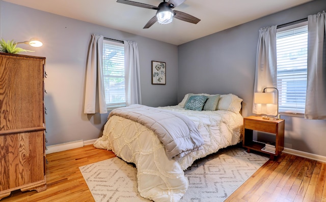 1441 Lewison Ave NE, Grand Rapids, MI 49505 - bedroom featuring light wood-style floors and ceiling fan