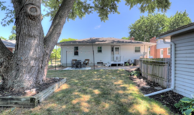 1441 Lewison Ave NE, Grand Rapids, MI 49505 - back of house featuring a patio