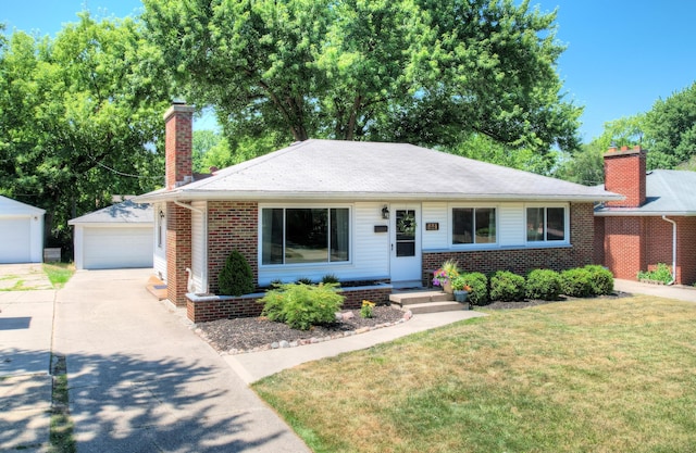 1441 Lewison Ave NE, Grand Rapids, MI 49505 - view of front facade featuring a chimney, a front lawn, a detached garage, brick siding, and an outdoor structure