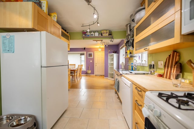 31124 Geraldine St, Westland, MI 48185 - kitchen featuring white appliances, light tile patterned flooring, wood counters, and open shelves
