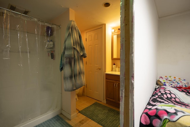 31124 Geraldine St, Westland, MI 48185 - full bathroom featuring vanity, curtained shower, and tile patterned flooring