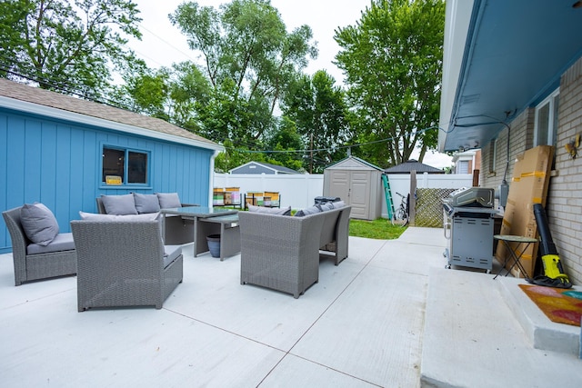 31124 Geraldine St, Westland, MI 48185 - fenced backyard featuring an outdoor living space, a grill, a storage unit, and a patio area