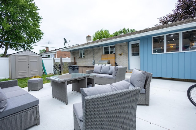 31124 Geraldine St, Westland, MI 48185 - view of patio / terrace featuring an outdoor living space, a storage unit, and outdoor dining space