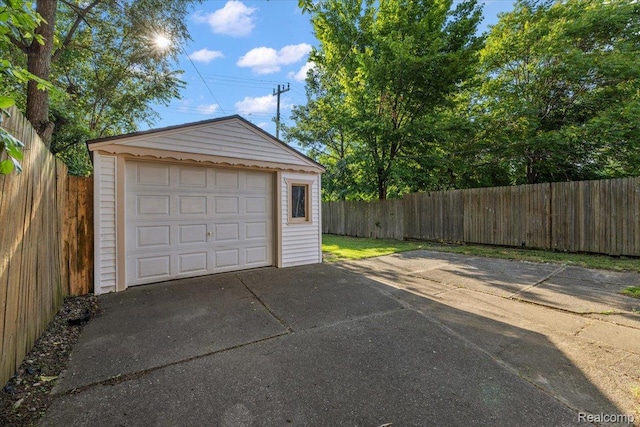 18285 Faust Ave, Detroit, MI 48219 - detached garage featuring driveway