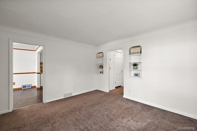 18285 Faust Ave, Detroit, MI 48219 - carpeted spare room with a textured ceiling and baseboards