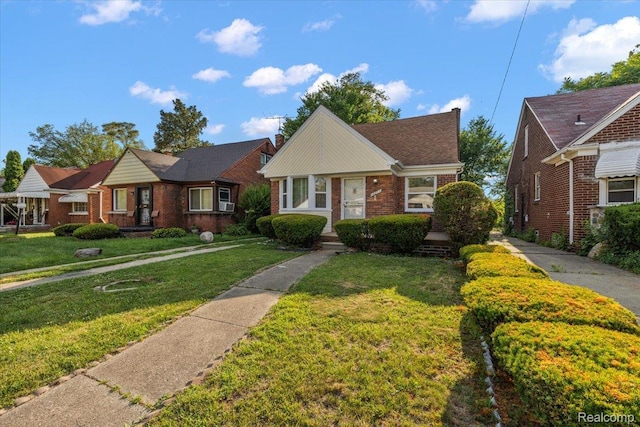 18285 Faust Ave, Detroit, MI 48219 - bungalow-style house with a front yard and brick siding