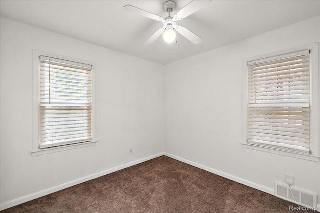 18285 Faust Ave, Detroit, MI 48219 - unfurnished room with dark colored carpet and ceiling fan