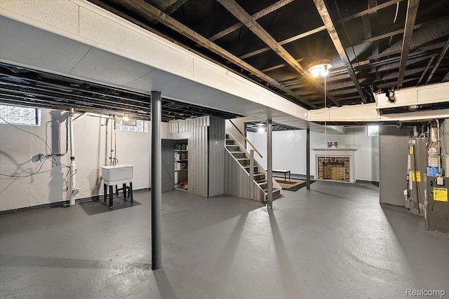 18285 Faust Ave, Detroit, MI 48219 - basement featuring stairway and gas water heater