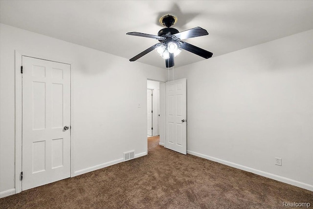 18285 Faust Ave, Detroit, MI 48219 - unfurnished bedroom with dark carpet and a ceiling fan