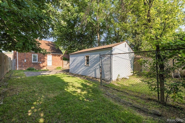 18285 Faust Ave, Detroit, MI 48219 - view of outdoor structure featuring a fenced backyard