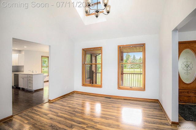 161OXBOW Oxbow Lake Rd, White Lake, MI 48386 - foyer entrance with plenty of natural light, a chandelier, dark wood-type flooring, and high vaulted ceiling