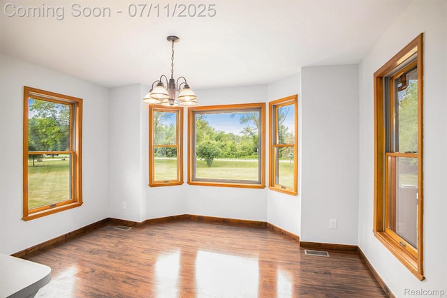 161OXBOW Oxbow Lake Rd, White Lake, MI 48386 - empty room with a chandelier and wood finished floors