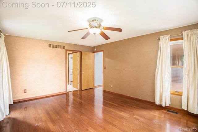 161OXBOW Oxbow Lake Rd, White Lake, MI 48386 - unfurnished room with a ceiling fan and wood finished floors