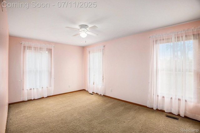 161OXBOW Oxbow Lake Rd, White Lake, MI 48386 - carpeted empty room with healthy amount of natural light and a ceiling fan