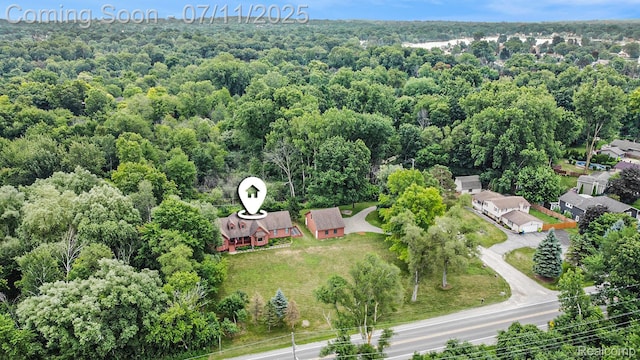 161OXBOW Oxbow Lake Rd, White Lake, MI 48386 - bird's eye view of a heavily wooded area