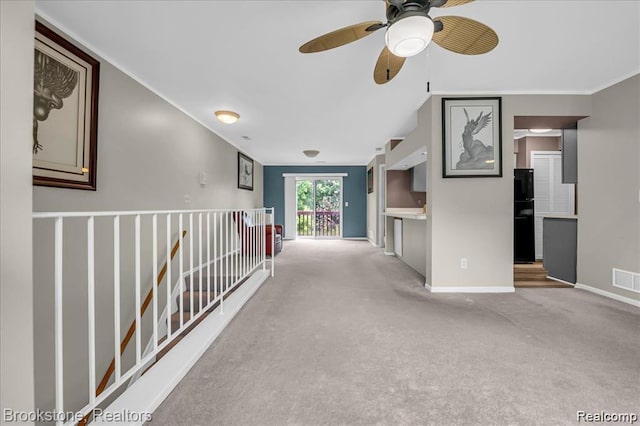 1574 Meadow Side Dr, Rochester Hills, MI 48307 - unfurnished living room with a ceiling fan, carpet flooring, and crown molding