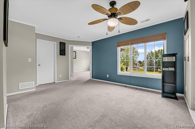 1574 Meadow Side Dr, Rochester Hills, MI 48307 - carpeted empty room with a ceiling fan and ornamental molding