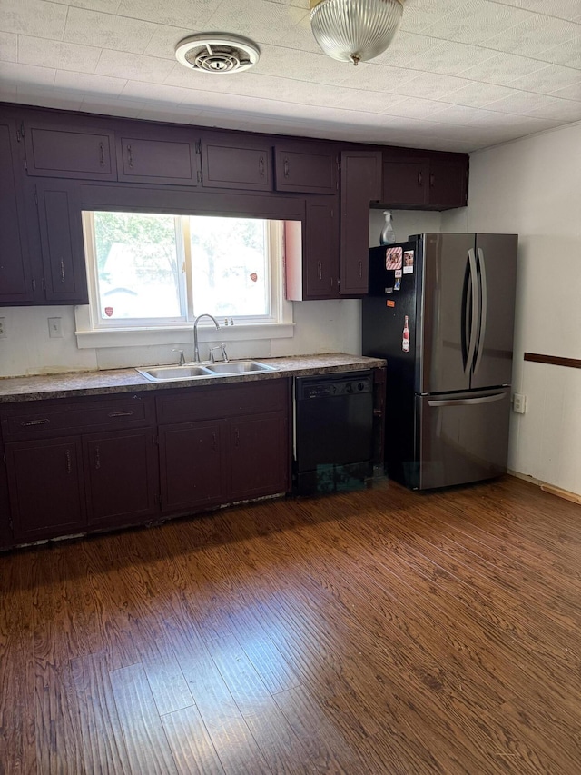 2754 Huizenga St, Norton Shores, MI 49444 - kitchen featuring freestanding refrigerator, dishwasher, and dark wood-type flooring