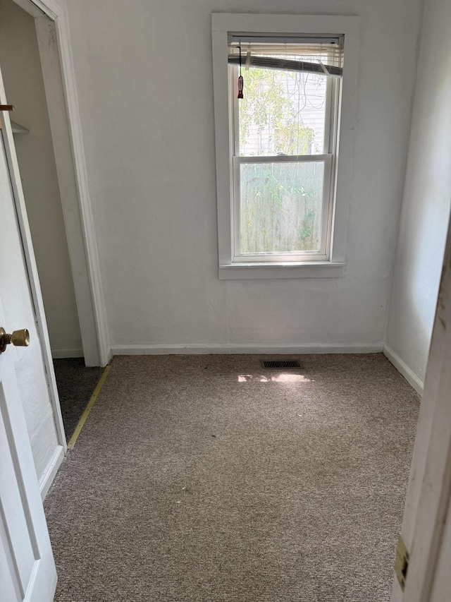 2754 Huizenga St, Norton Shores, MI 49444 - carpeted empty room with baseboards