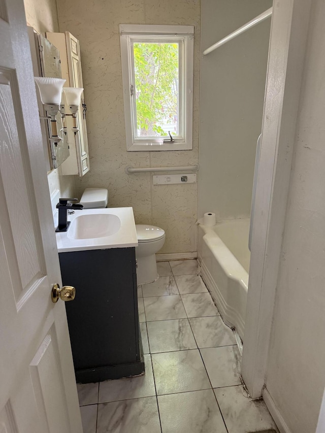 2754 Huizenga St, Norton Shores, MI 49444 - bathroom featuring vanity and marble finish flooring