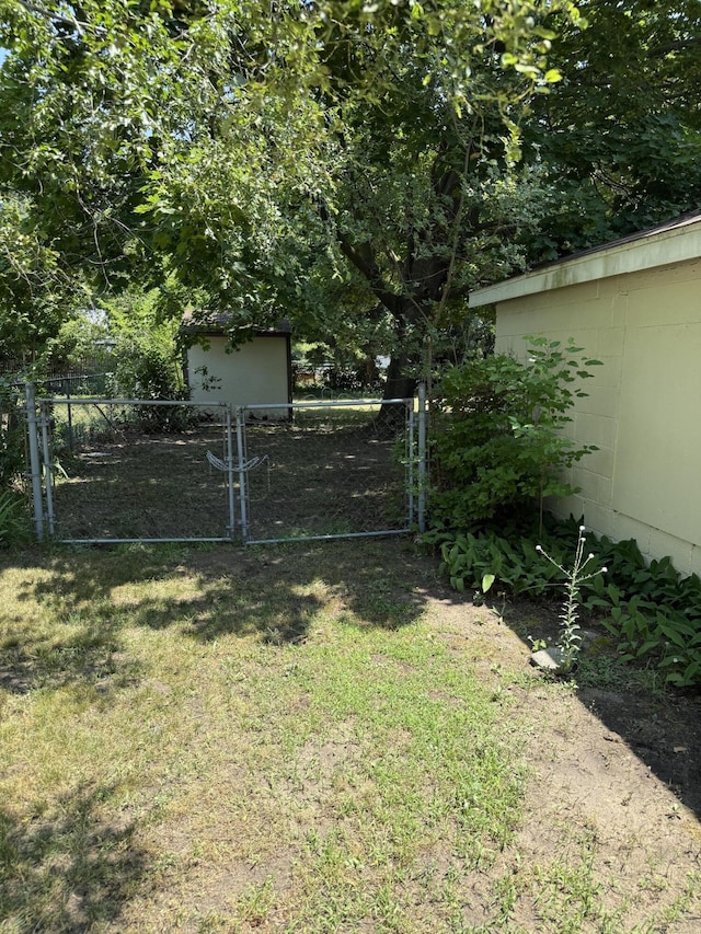 2754 Huizenga St, Norton Shores, MI 49444 - view of yard featuring an outbuilding