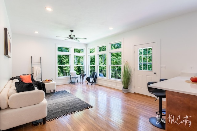 68 E River Rd, Muskegon, MI 49445 - living room featuring ceiling fan, light wood-style floors, and recessed lighting