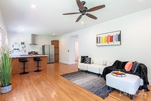 68 E River Rd, Muskegon, MI 49445 - living area with light wood-style floors, ceiling fan, and recessed lighting