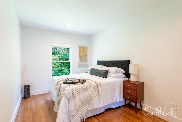 68 E River Rd, Muskegon, MI 49445 - bedroom with hardwood / wood-style floors and recessed lighting