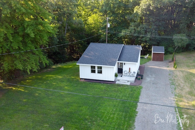 68 E River Rd, Muskegon, MI 49445 - view from above of property with a forest