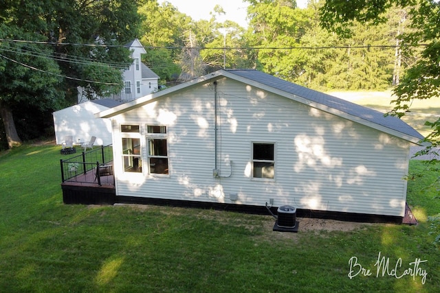 68 E River Rd, Muskegon, MI 49445 - view of side of property featuring a yard and a deck