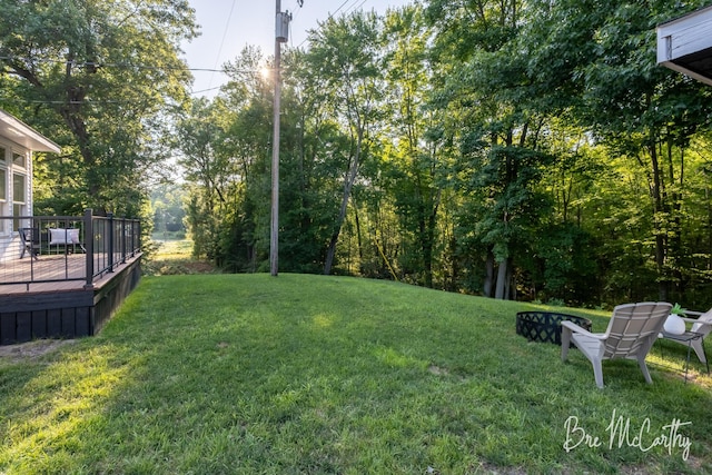 68 E River Rd, Muskegon, MI 49445 - view of green lawn featuring a wooden deck