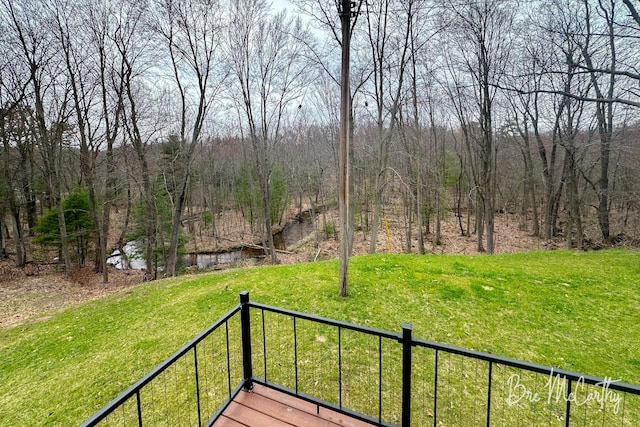 68 E River Rd, Muskegon, MI 49445 - view of yard with a forest view