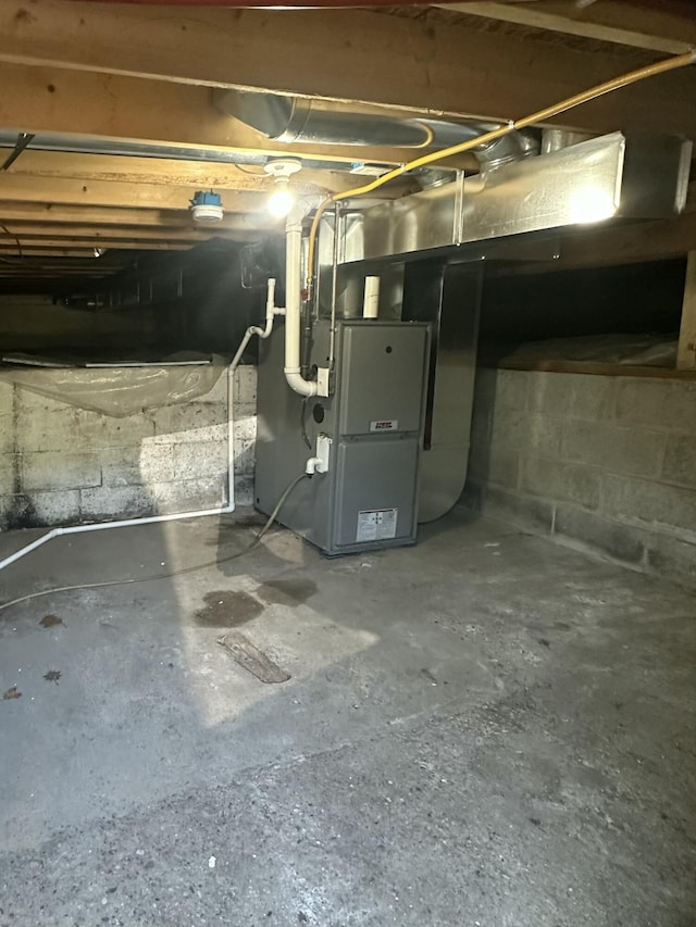 68 E River Rd, Muskegon, MI 49445 - unfinished basement with heating unit