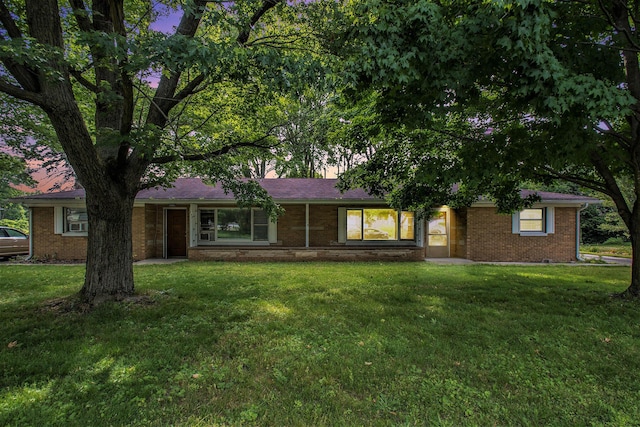 157 Elvern Dr, Coloma, MI 49038 - view of front facade featuring brick siding and a front lawn