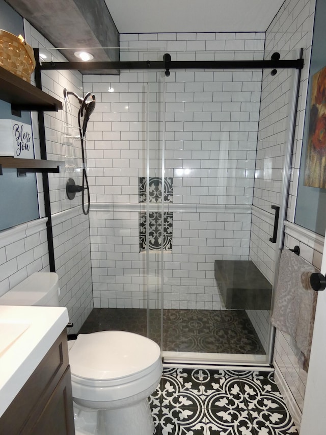630 Forest St, Wyandotte, MI 48192 - bathroom featuring vanity, a shower stall, and tile patterned floors