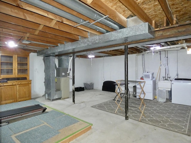 630 Forest St, Wyandotte, MI 48192 - unfinished below grade area featuring independent washer and dryer, refrigerator, and heating unit