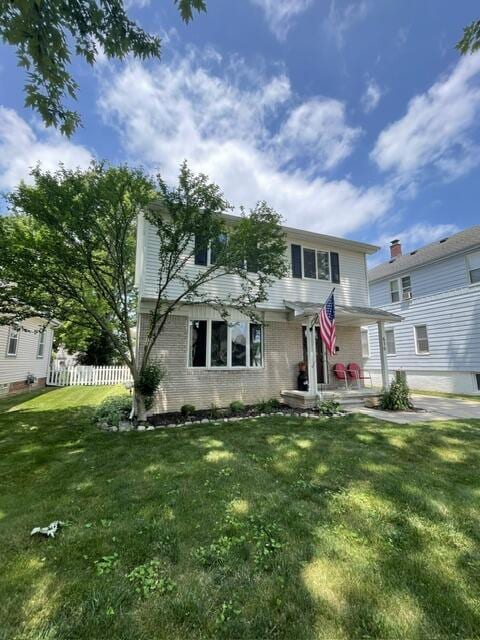 630 Forest St, Wyandotte, MI 48192 - view of front of property with brick siding
