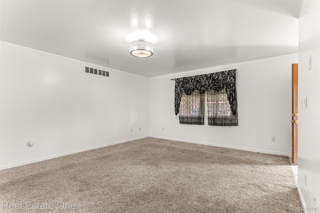 1625 Ferney St, Dearborn Heights, MI 48120 - carpeted spare room featuring baseboards