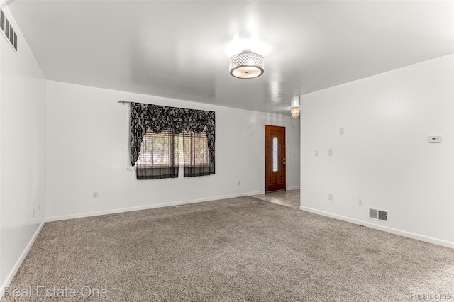 1625 Ferney St, Dearborn Heights, MI 48120 - carpeted spare room featuring baseboards