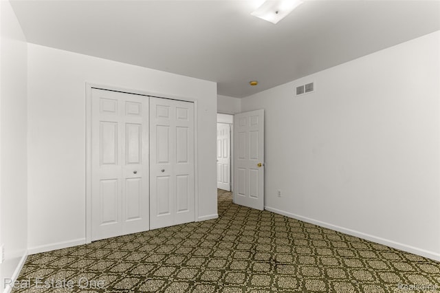 1625 Ferney St, Dearborn Heights, MI 48120 - unfurnished bedroom featuring baseboards and a closet